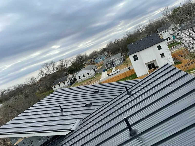 Standing seam metal roof panels with vents for Skylight Repair in Cameron
